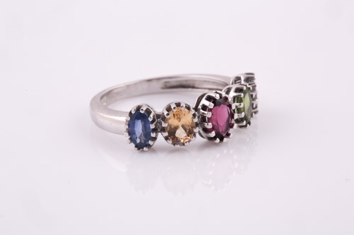 Lot 67 - A 9ct white gold and rainbow gemstone ring,...