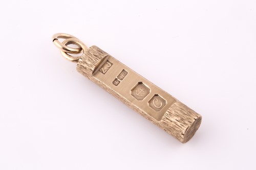 Lot 273 - A 9 carat gold hallmark pendant; in the form...