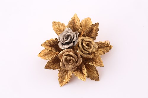 Lot 188 - An 18 carat gold rose brooch; the centre set...