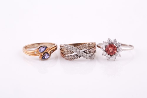 Lot 92 - A 9ct yellow gold and diamond crossover ring,...