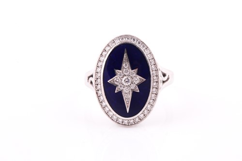 Lot 109 - An 18ct white gold, diamond, and blue enamel...