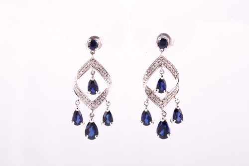 Lot 117 - A pair of 9ct white gold diamond, and sapphire...