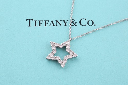 Lot 275 - Tiffany & Co. A platinum and diamond...