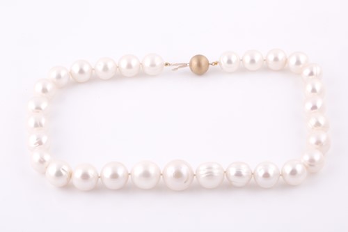 Lot 107 - A large freshwater pearl necklace, the pearls...