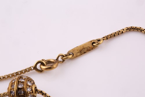 Lot 30 - A diamond pavé set spherical pendant necklace,...