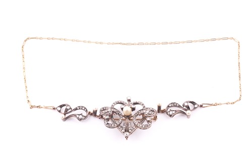 Lot 219 - An Edwardian diamond and pearl yellow metal...