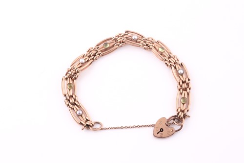 Lot 415 - 9ct yellow gold gate-link bracelet, set with...
