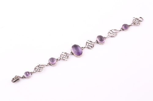 Lot 265 - An Arts & Crafts silver and amethyst bracelet...