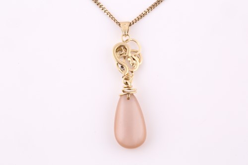 Lot 4 - A diamond and pear shape moonstone pendant, on...