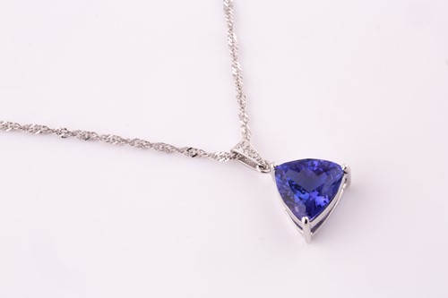 Lot 253 - A tanzanite and diamond pendant, the...