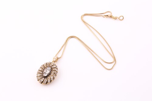 Lot 24 - A late 19th century French oval locket/pendant,...