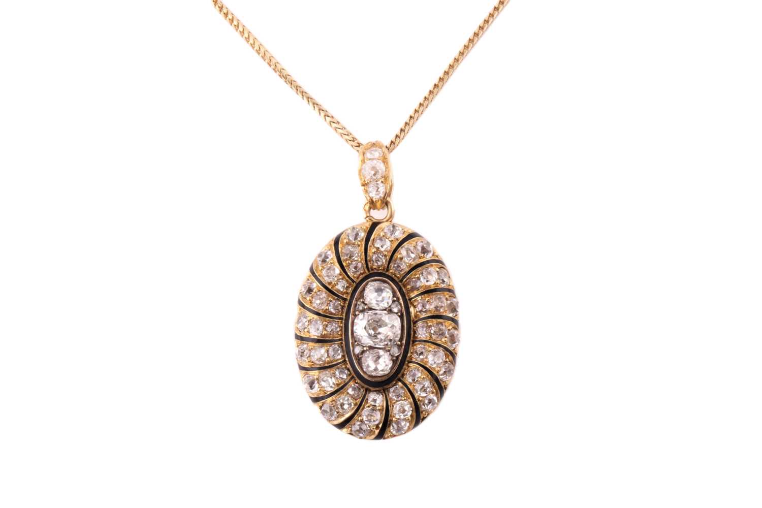 Lot 24 - A late 19th century French oval locket/pendant,...