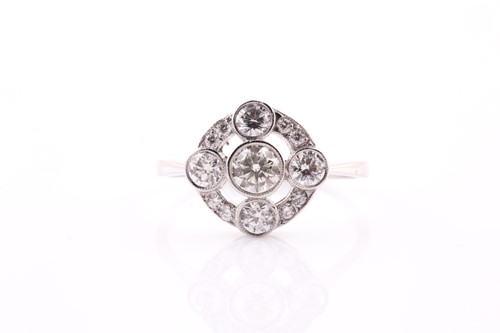 Lot 300 - A platinum and diamond cluster ring,set with...