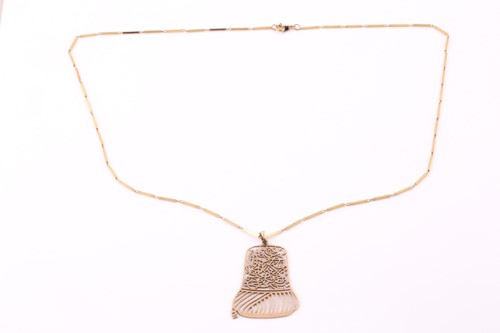 Lot 155 - A Turkish yellow metal pendant and chain, the...