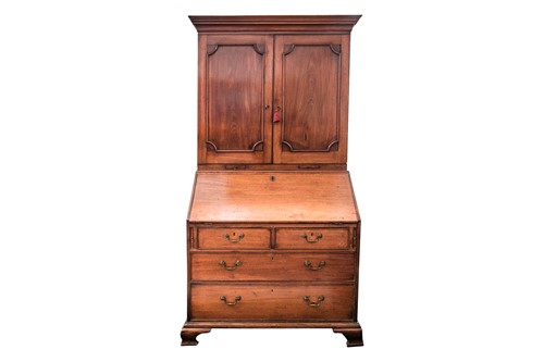 Lot 111 - A George III mahogany bureau bookcase. The...