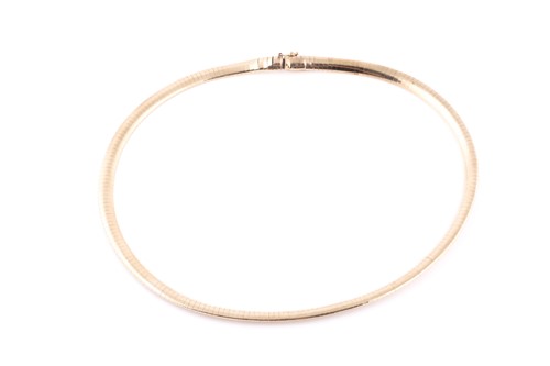 Lot 31 - A 9ct yellow gold flat-link bib-style necklace,...