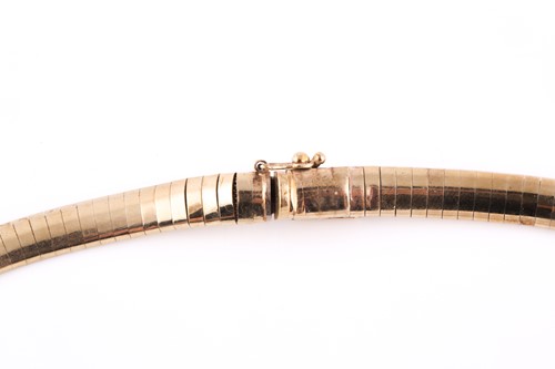 Lot 31 - A 9ct yellow gold flat-link bib-style necklace,...