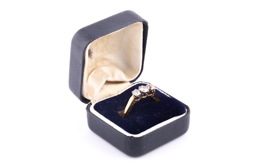 Lot 38 - An 18ct yellow gold and diamond ring, set with...