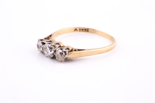 Lot 38 - An 18ct yellow gold and diamond ring, set with...