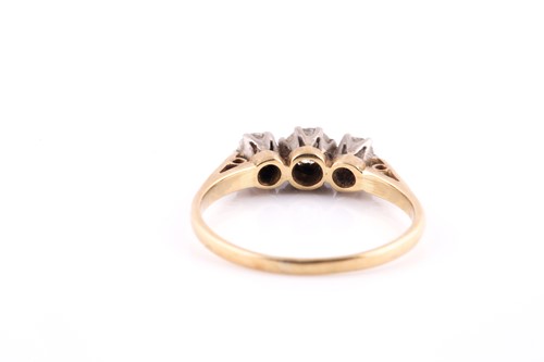 Lot 38 - An 18ct yellow gold and diamond ring, set with...