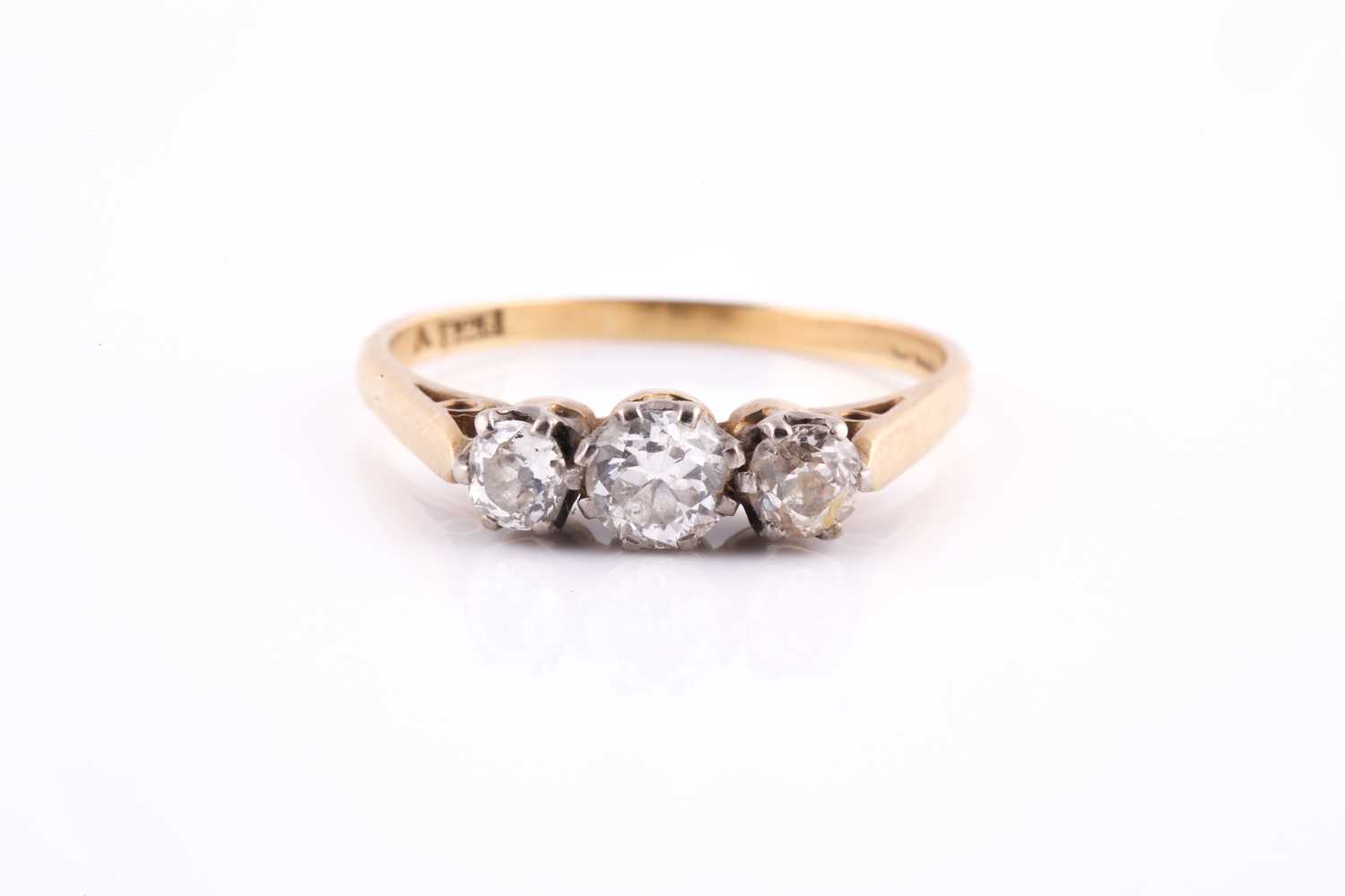 Lot 38 - An 18ct yellow gold and diamond ring, set with...