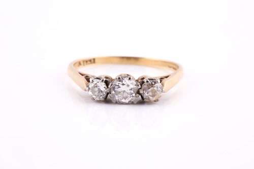 Lot 38 - An 18ct yellow gold and diamond ring, set with...