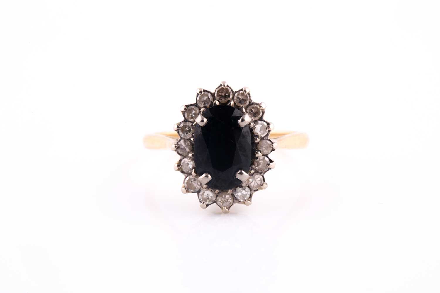Lot 43 - An 18ct yellow gold, diamond, and sapphire...