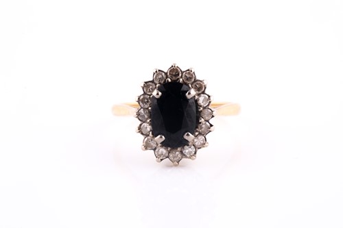 Lot 43 - An 18ct yellow gold, diamond, and sapphire...