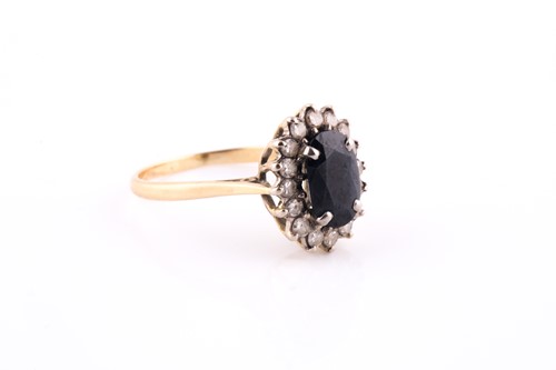 Lot 43 - An 18ct yellow gold, diamond, and sapphire...