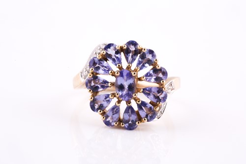 Lot 209 - A 9ct yellow gold, diamond, and tanzanite...