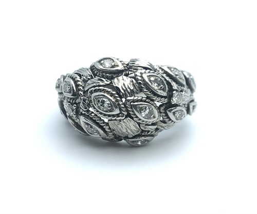 Lot 255 - A white gold and cubic zirconia bombe style...
