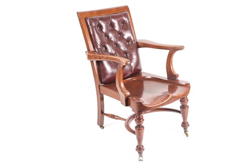 Lot 215 - A late Victorian mahogany desk chair with...