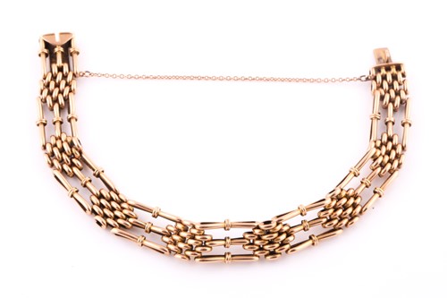 Lot 443 - A fancy gate link bracelet with concealed push...