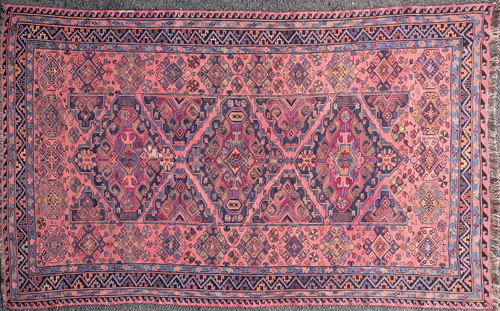 Lot 203 - A 20th-century red ground Caucasian Soumak...