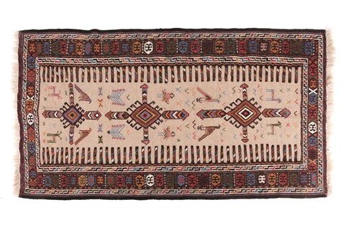 Lot 181 - A 20th-century oatmeal ground figural jajim...