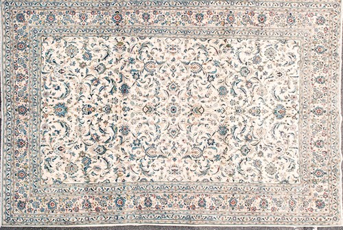Lot 188 - A 20th-century ivory ground Kashan carpet with...