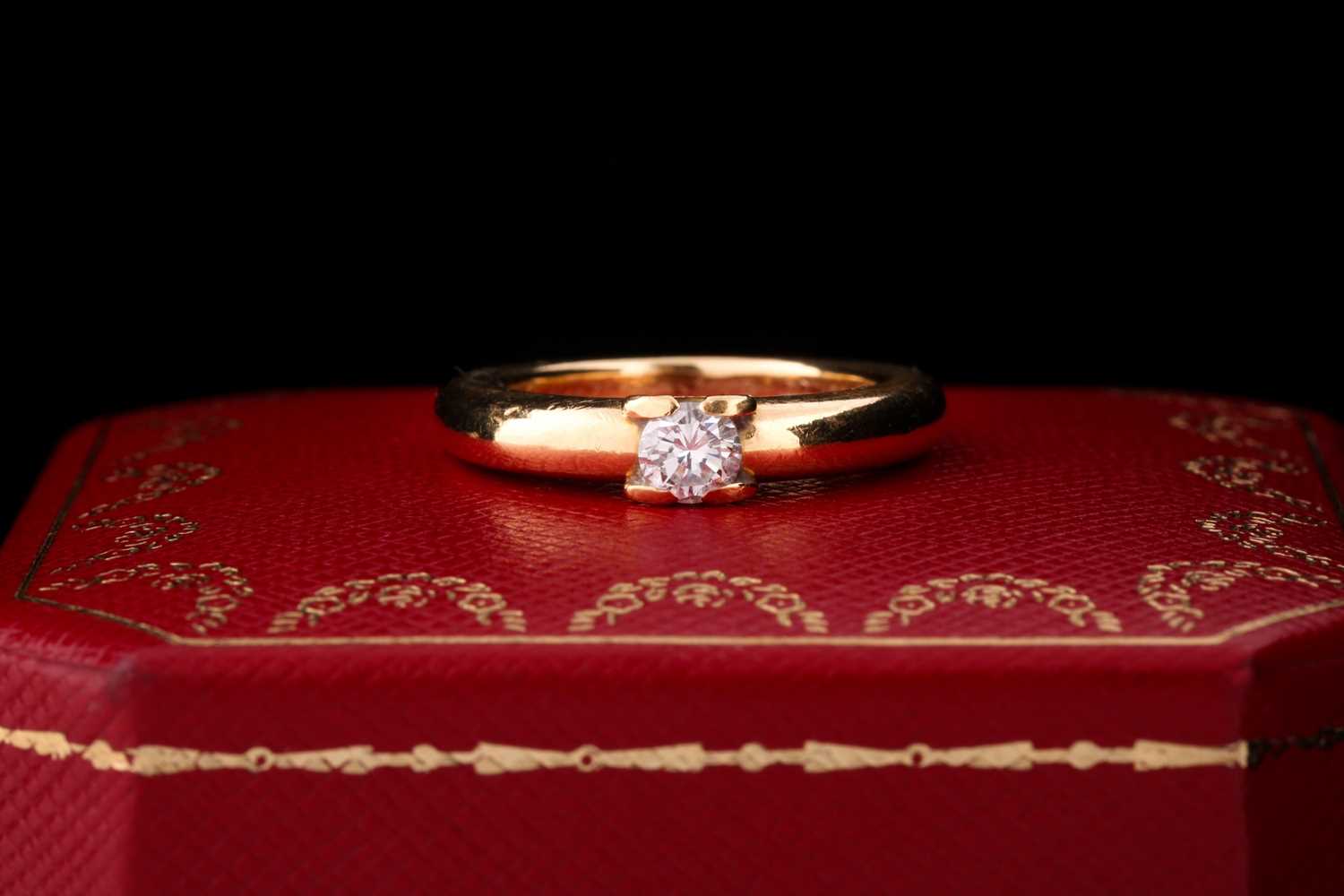 Lot 625 - A diamond single-stone ring by Cartier The...