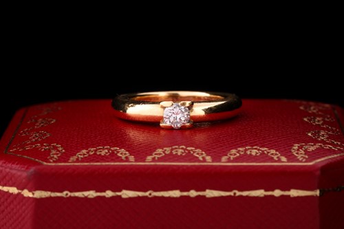 Lot 625 - A diamond single-stone ring by Cartier The...