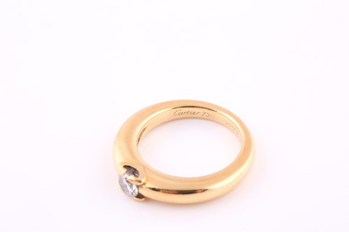 Lot 625 - A diamond single-stone ring by Cartier The...