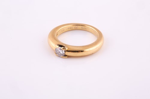 Lot 625 - A diamond single-stone ring by Cartier The...