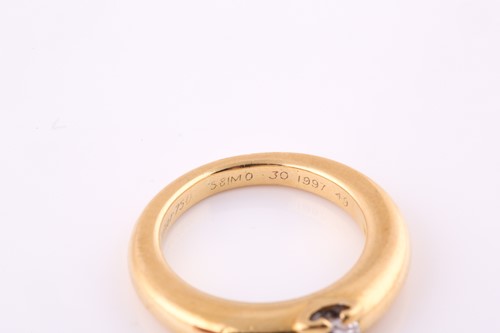 Lot 625 - A diamond single-stone ring by Cartier The...
