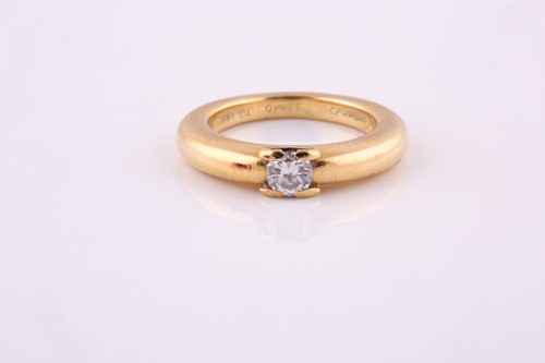Lot 625 - A diamond single-stone ring by Cartier The...