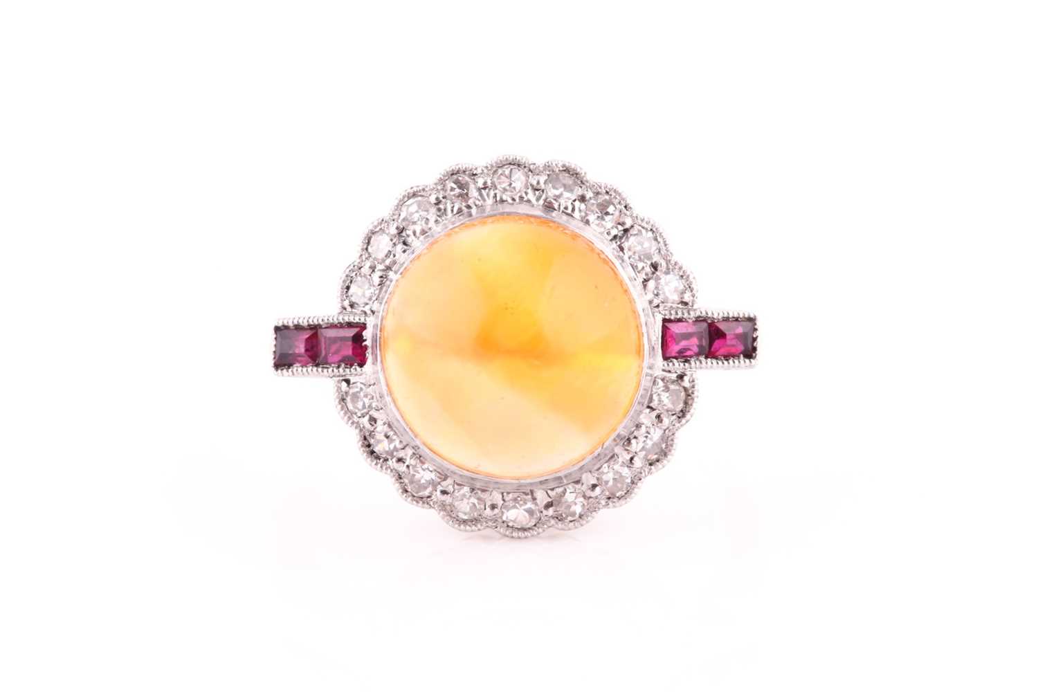 Lot 551 - An Art Deco opal, ruby and diamond ring,of...