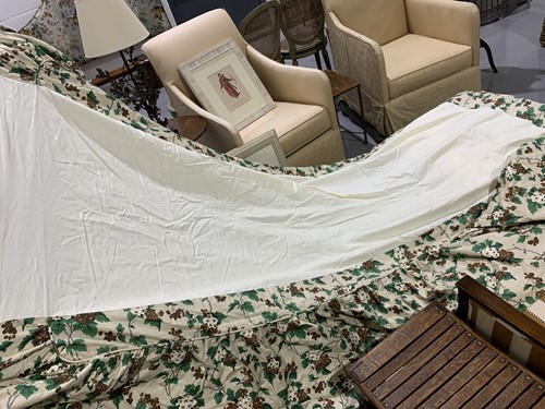 Lot 10 - A pair of floral chintz upholstered serpentine...