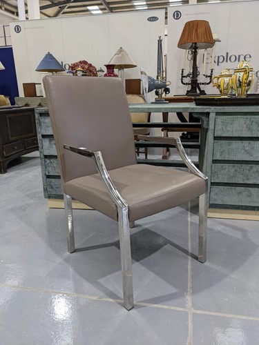 Lot 106 - A contemporary chromed steel and grey leather...