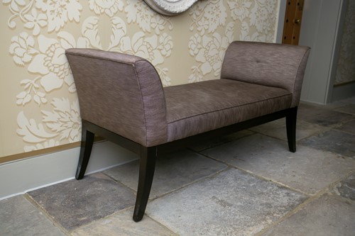 Lot 110 - A 20th century double ended banquette or...