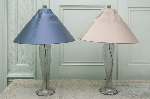 Lot 113 - A pair of contemporary slender baluster bubble...
