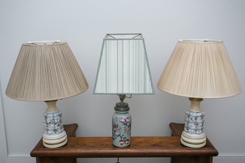 Lot 12 - A pair of French faux oil porcelain table...