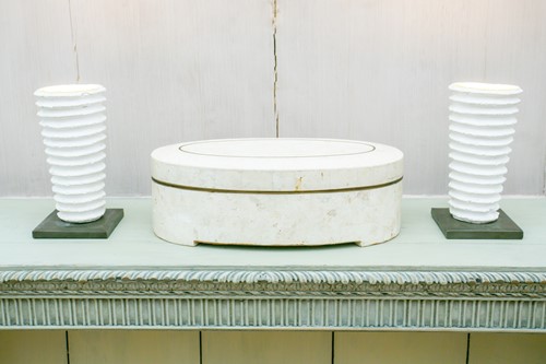 Lot 121 - A pair of decorative ribbed cocoon form table...