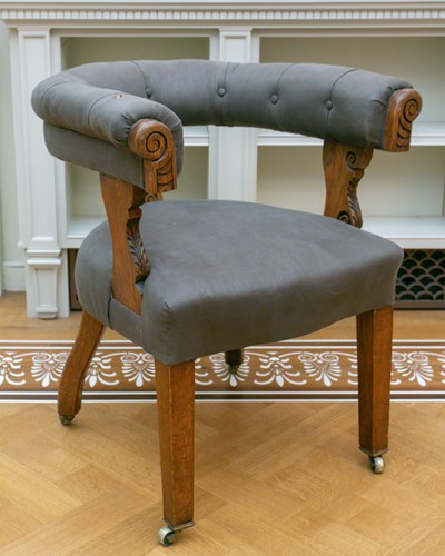 Lot 37 - A late Victorian oak 'horseshoe' backed tub...